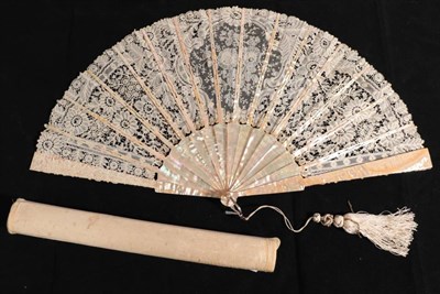Lot 2152 - A Large Mixed Brussels Lace Fan, circa 1880's, the bobbin lace leaf with large central detail...