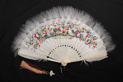 Lot 2184 - A Good Chinese Carved Ivory Fan, Qing Dynasty, the guards deeply carved, mounted with painted white