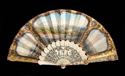 Lot 2083 - A Russian Marriage Fan, circa 1851, a very rare and extravagant ivory fan, the guards mounted...