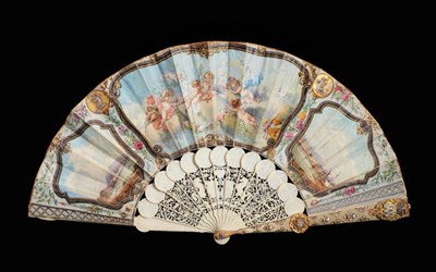 Lot 2083 - A Russian Marriage Fan, circa 1851, a very rare and extravagant ivory fan, the guards mounted...
