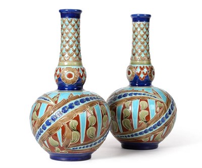 Lot 502 - A Pair of Burmantofts Faience Pottery Vases, shape No.2061, decorated with stylised flowers and...