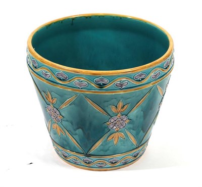 Lot 508 - A Minton Secessionist Planter, circa 1900, tube lined with stylised flower heads and leaves...