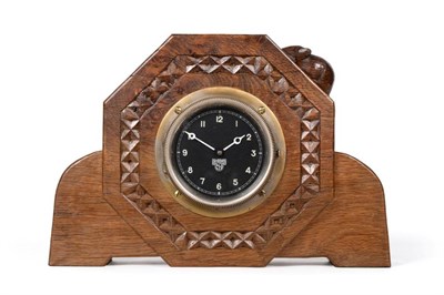 Lot 551 - Mouseman: A Robert Thompson of Kilburn English Burr Oak Mantel Clock, of octagonal design, set with