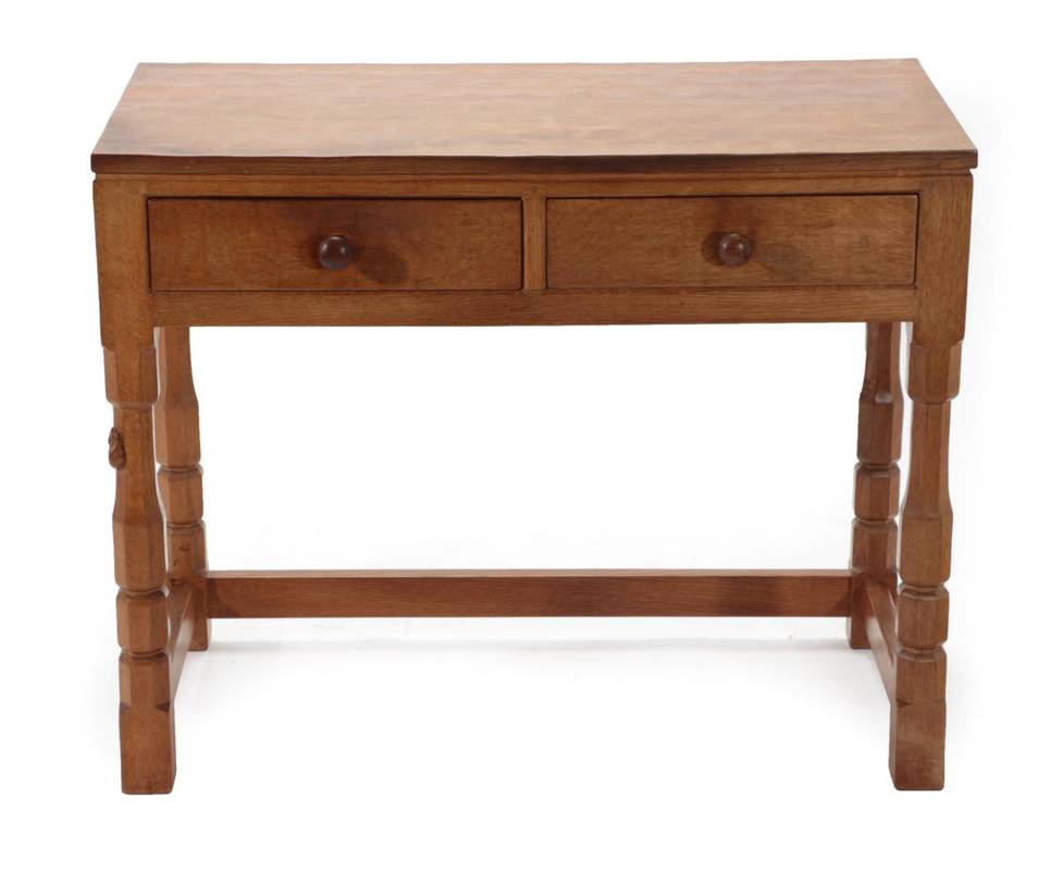 Lot 559 - Mouseman: A Robert Thompson of Kilburn English Oak Hall Table, the rectangular top with two drawers