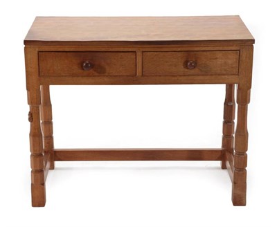 Lot 559 - Mouseman: A Robert Thompson of Kilburn English Oak Hall Table, the rectangular top with two drawers