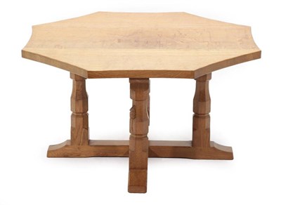 Lot 561 - Mouseman: A Robert Thompson of Kilburn English Oak Octagonal Table, on four octagonal legs...