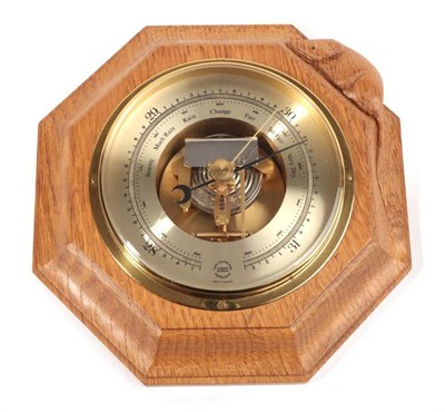Lot 566 - Mouseman: A Robert Thompson of Kilburn English Oak Barometer, the octagonal frame mounted with...