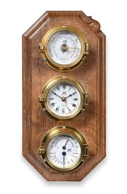 Lot 567 - Mouseman: A Robert Thompson of Kilburn English Oak Barometer/Hygrometer/Thermometer, a brass...
