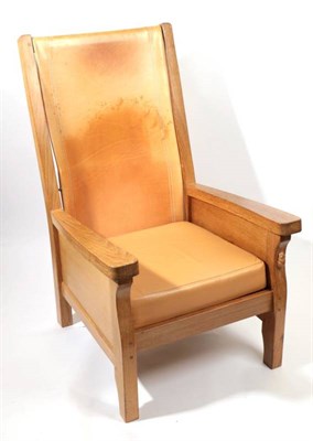 Lot 586 - Mouseman: A Robert Thompson of Kilburn English Oak Smoking Chair, with slung leather back,...