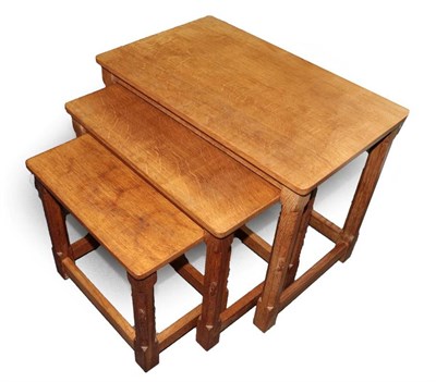 Lot 590 - Mouseman: A Robert Thompson of Kilburn English Oak Nest of Tables, each with carved mouse...