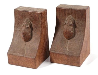 Lot 597 - Mouseman: A Pair of Robert Thompson of Kilburn English Oak Bookends, each with carved mouse...