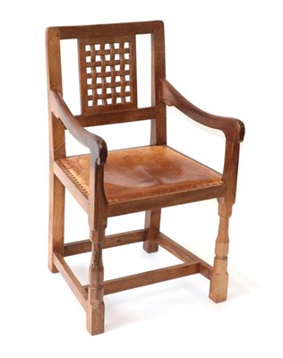 Lot 603 - Mouseman: A Robert Thompson of Kilburn English Oak Lattice Back Armchair, with tan hide seat,...