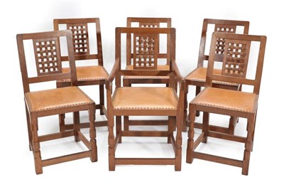 Lot 631 - A Set of Six (5+1) Sid Pollard of Thirsk English Oak Lattice Back Dining Chairs, tan hide seats, on