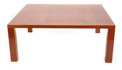 Lot 657 - A Cherrywood High Gloss Coffee Table, modern, of square form, on block legs, 130cm by 130cm by 50cm