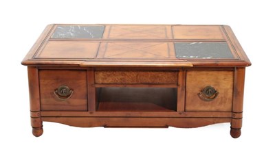 Lot 659 - A Hardwood Coffee Table, modern, the extending top flanked by two marble insert panels with...