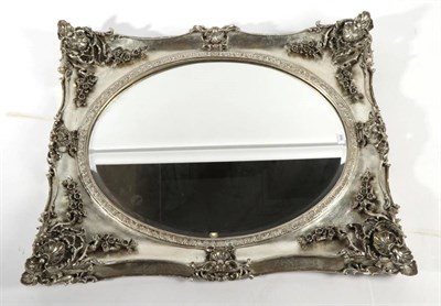 Lot 698 - Laura Ashley: A Beth Champagne Rectangular Mirror, modern, with oval bevelled glass mirror...