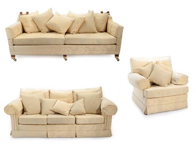 Lot 703 - A Three Piece Duresta Lounge Suite, modern, covered in cream/yellow fabric decorated with...