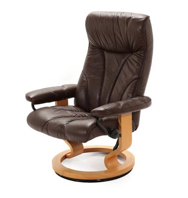 Lot 728 - A Norwegian Ekornes Stressless Reclining Swivel Chair, 80cm by 71cm by 104cm