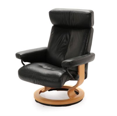 Lot 729 - A Norwegian Ekornes Stressless Reclining Swivel Chair, 76cm by 75cm by 97cm