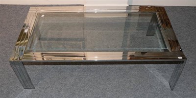 Lot 743 - A 1970's Chromed Metal Rectangular Coffee Table, the frame and legs in three sections, with a glass