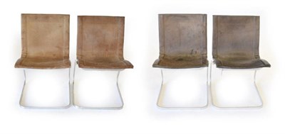 Lot 747 - Four Vintage Metal Tubular and Leather Cantilever Chairs, comprising two covered in light tan...