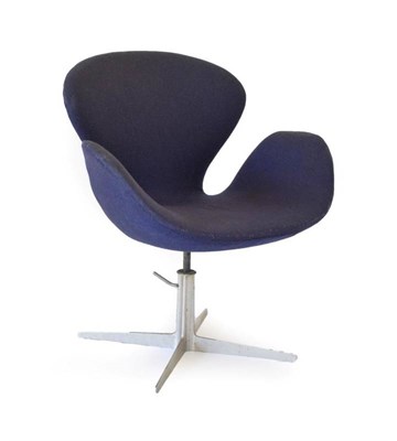 Lot 752 - Arne Jacobsen for Fritz Hansen: A Swan Swivel Armchair, circa 1957, upholstered in blue fabric,...