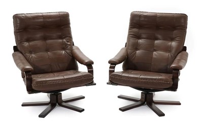 Lot 756 - A Pair of Danish Formed Laminate Swivel Chairs, upholstered in leather, 76cm by 88cm by 96cm