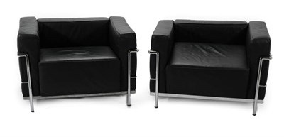 Lot 766 - A Pair of Black Leather Armchairs, modern, of square form with polished chrome tubular frame...