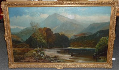 Lot 1000 - Walter Meegan (1859-1944) Lakeland Landscape with a Boat on a Shoreline  Signed, oil on canvas,...