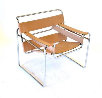 Lot 777 - A Wassily Model B3 Style Armchair after a design by Marcel Breuer, modern, covered in light tan...