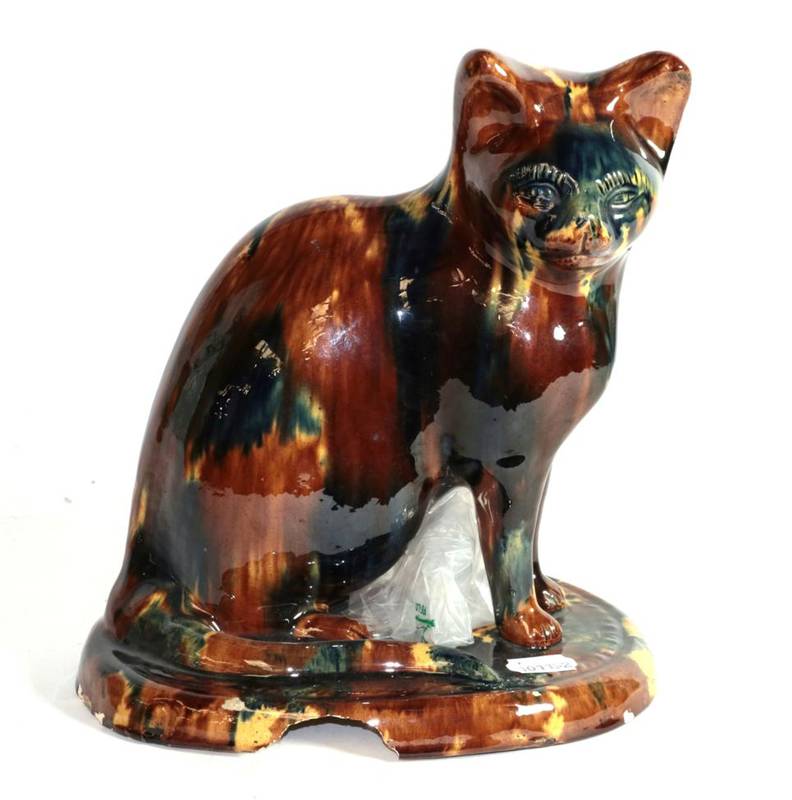 Lot 4 - Canny Hill pottery treacle glazed cat