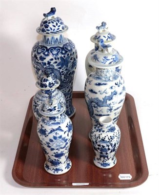 Lot 7 - Five various 20th century Chinese blue and white baluster vases and covers, each cover with a...