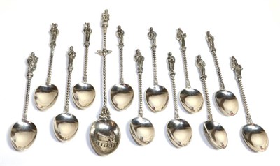 Lot 50 - A set of twelve Continental metalware, Apostle coffee spoons, probably German, marked F within...