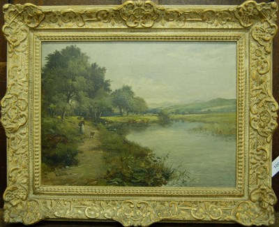 Lot 1006 - William Ashton ROI (1853-1927) River Landscape with a Girl and Dog on a Path Signed and dated...