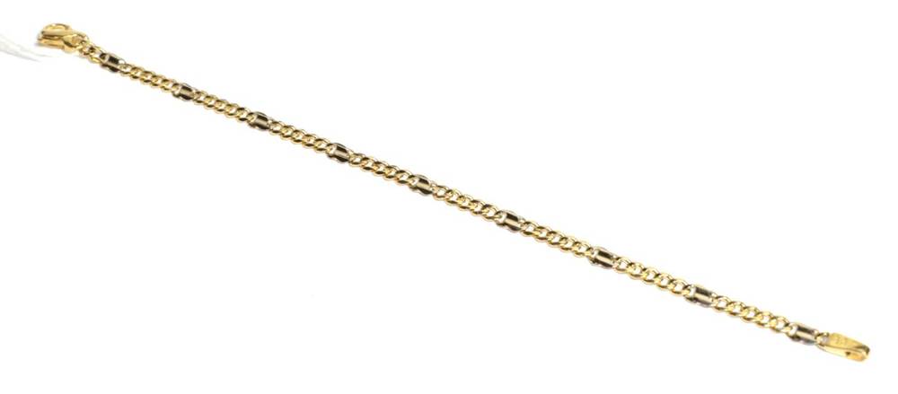 Lot 54 - An 18 carat gold fancy link bracelet, length 19cm