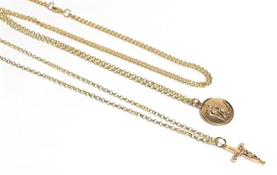 Lot 61 - A 9 carat gold crucifix pendant on a 9 carat gold chain, chain length 46cm; a 9 carat gold St....