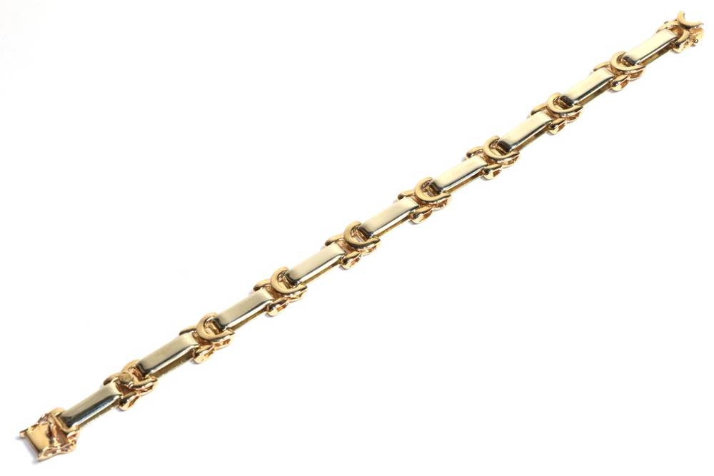 Lot 77 - A 9 carat two colour gold bar and x-link bracelet, length 19.5cm