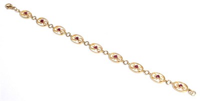 Lot 83 - A 9 carat gold gem set bracelet, length 19.5cm