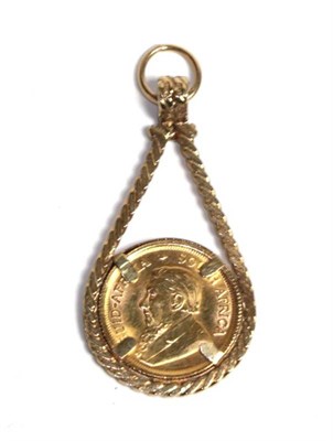 Lot 85 - A 1985 1/10th Krugerrand, in a 9 carat gold pendant mount