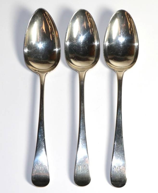 Lot 102 - A pair of George III silver table spoons, Richard Crossley, London, 1784; together with another...