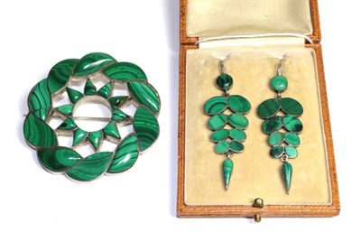 Lot 103 - A malachite brooch, diameter 6cm; and pair of earrings, drop length 6.1cm (a.f.) (boxed)