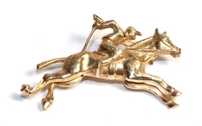 Lot 105 - A 9 carat gold horse and jockey brooch, length 4.5cm