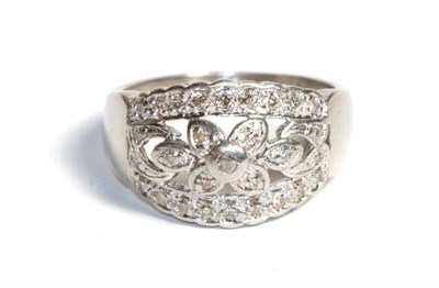 Lot 108 - A platinum diamond cluster ring, finger size Q