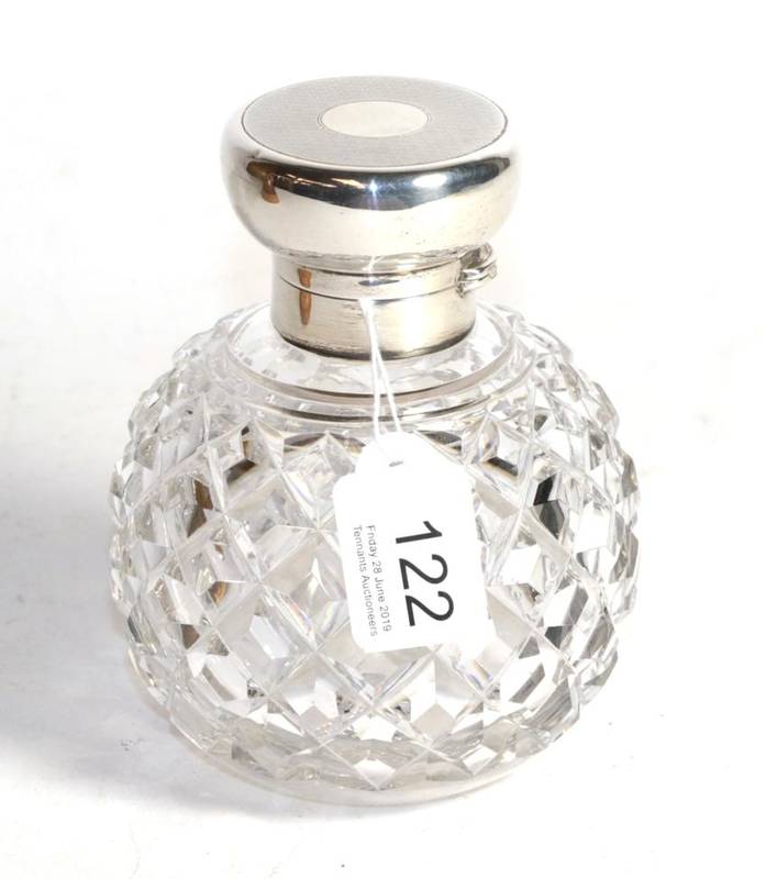Lot 122 - A silver mounted cut glass spherical scent bottle, Charles Dumenil, London 1919, 12.5cm high