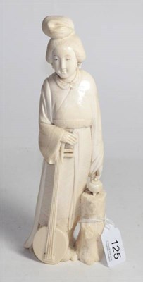 Lot 125 - An early 20th century ivory okimono of a standing lady with stringed instrument