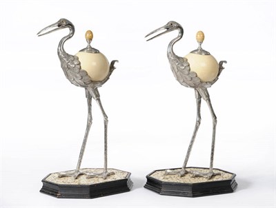 Lot 1021 - A Pair of Anthony Redmile Silver Plated Ostrich Egg Ornaments, circa 1970, modelled as standing...