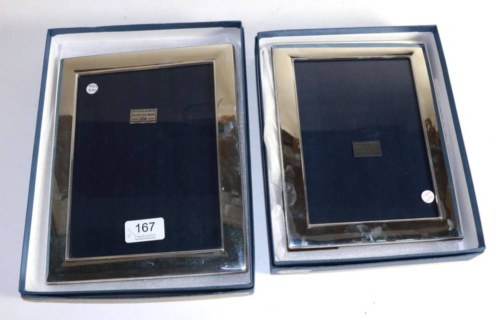 Lot 167 - Two similar modern rectangular silver photograph frames, both boxed and as new, 24.5cm and 22cm...