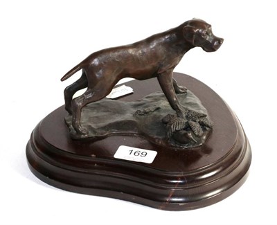 Lot 169 - A bronze model of a dog on a wooden plinth base, signed Munoz?