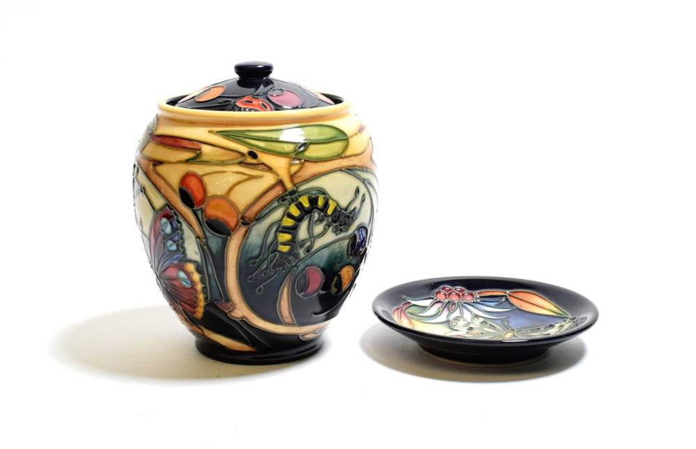 Lot 180 - A Moorcroft ''Hartgring'' pattern covered jar; together with a coaster, boxed
