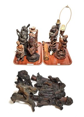 Lot 185 - A collection of Chinese root wood figures, two converted to lamp bases (two trays and a box)